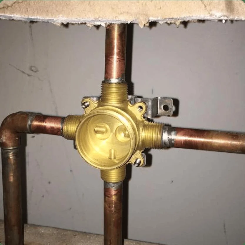 Copper water piping with fittings and valves
