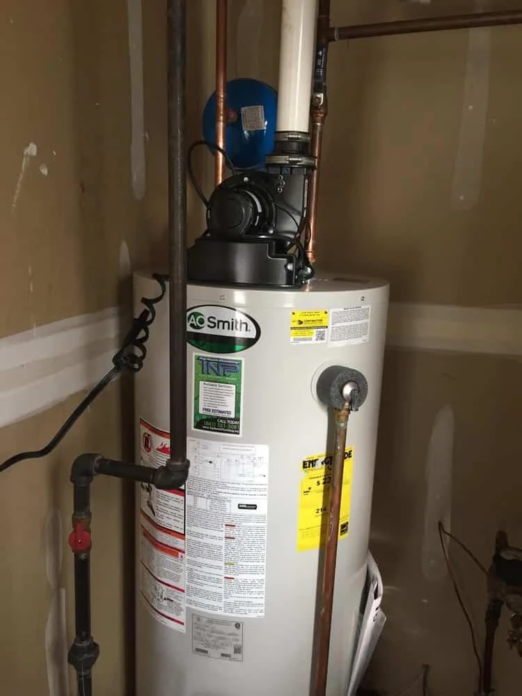 Residential tank water heater with supply connections